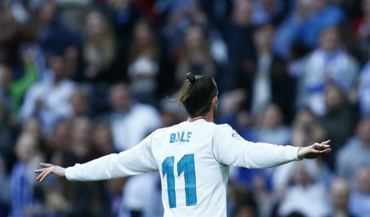 Gareth Bale celebrando uno de sus goles ante Celta de Vigo, en el estadio Santiago Bernabéu de Madrid