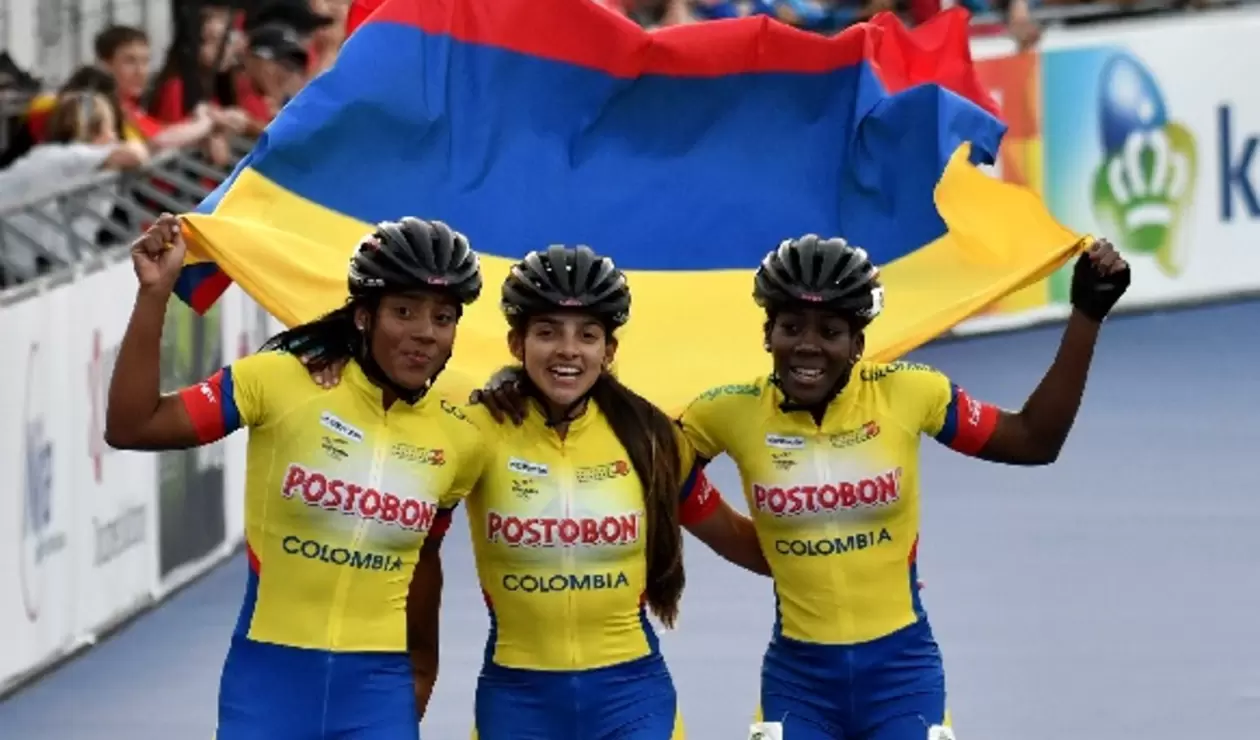 Fabriana Arias, Johana Viveros y Kerstinck Sarmiento celebrando una medalla de oro para Colombia