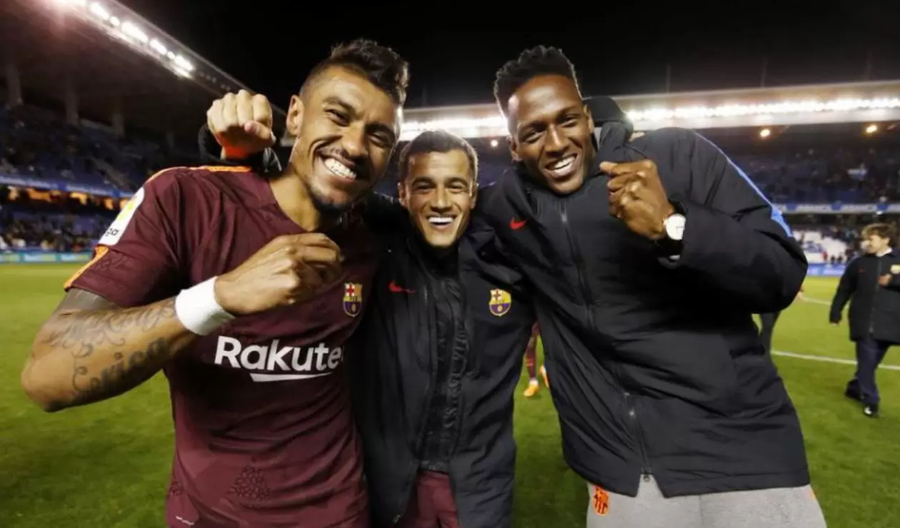 Paulinho, Coutinho y Yerry Mina en la celebración de la liga española con el Barcelona