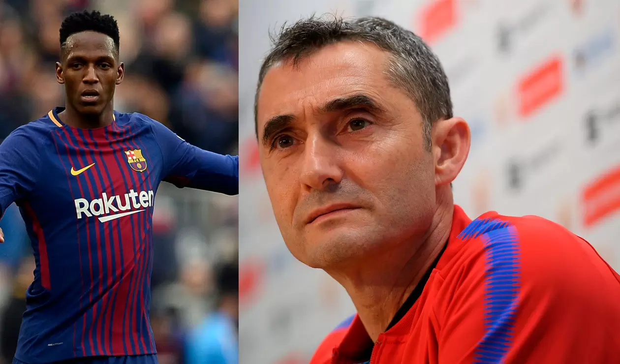 Yerry Mina y el técnico Ernesto Valverde, ambos del Barcelona