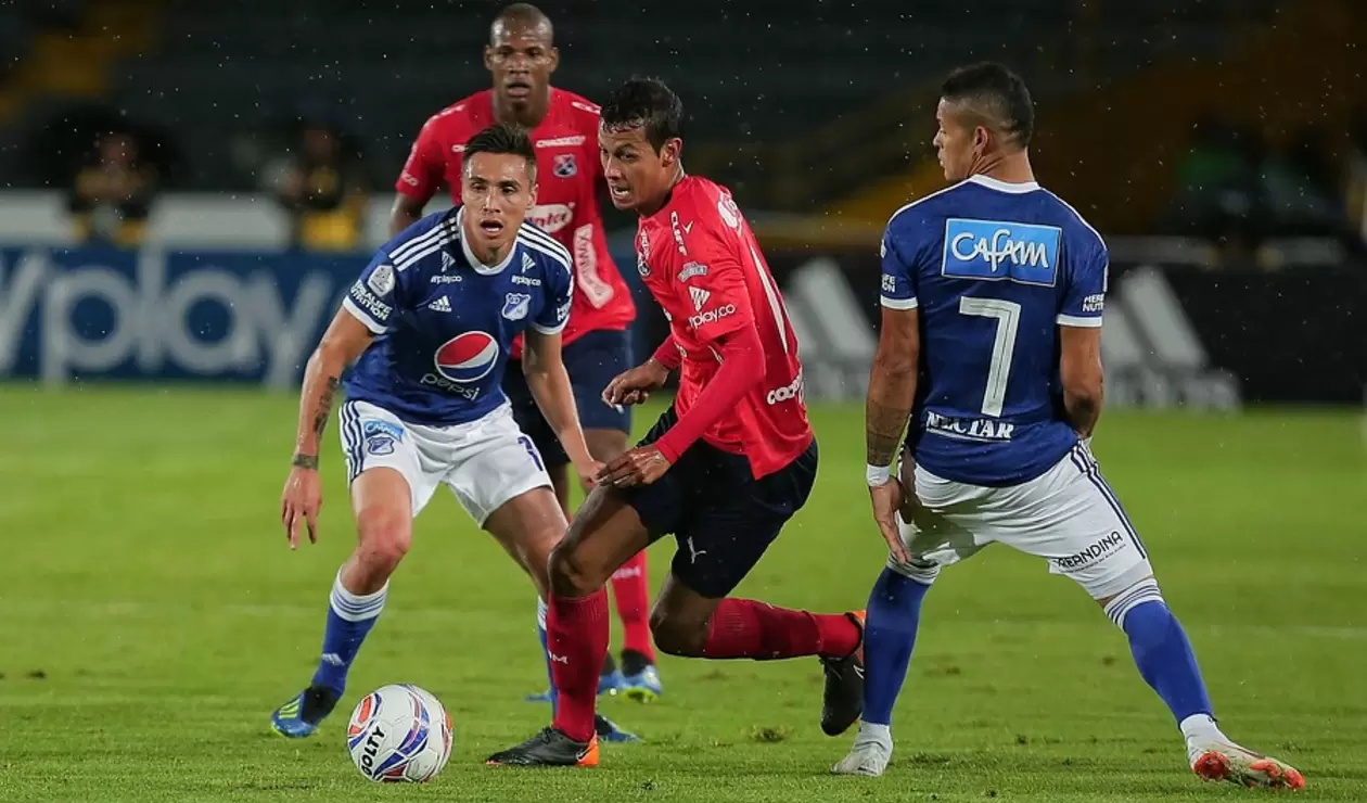 Henry Rojas, Jean Carlo Blanco y Ayron Del Valle en el juego entre Millonarios e Independiente Medellín