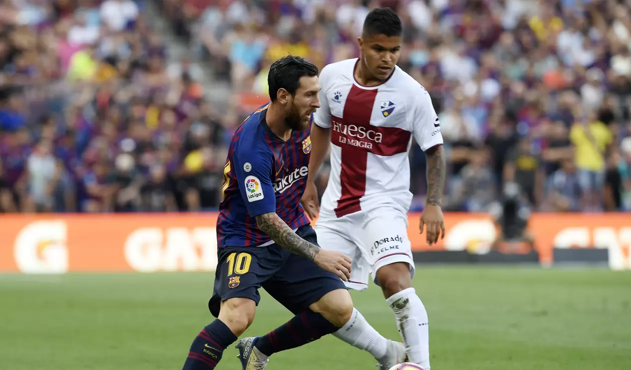 'Cucho' Hernández y Lionel Messi