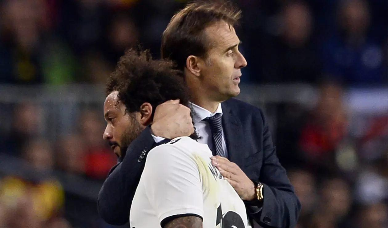 Julen Lopetegui, técnico del Madrid, abrazando a Marcelo