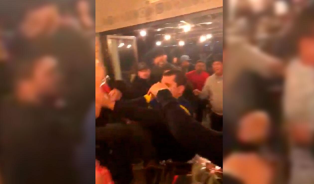 Video de aficionados de Boca y River en un restaurante en Madrid