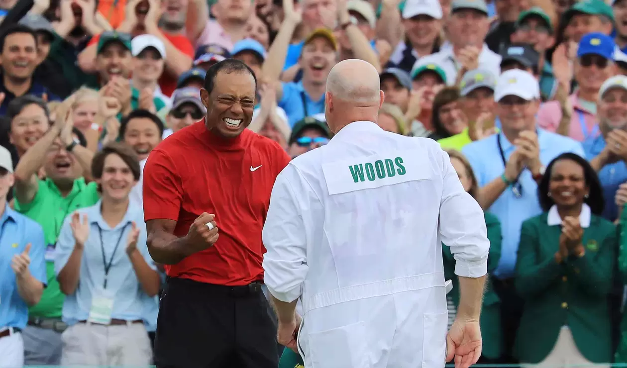 Tiger Woods y su caddie