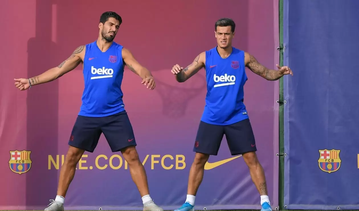 Suárez y Coutinho en un entrenamiento con el FC Barcelona