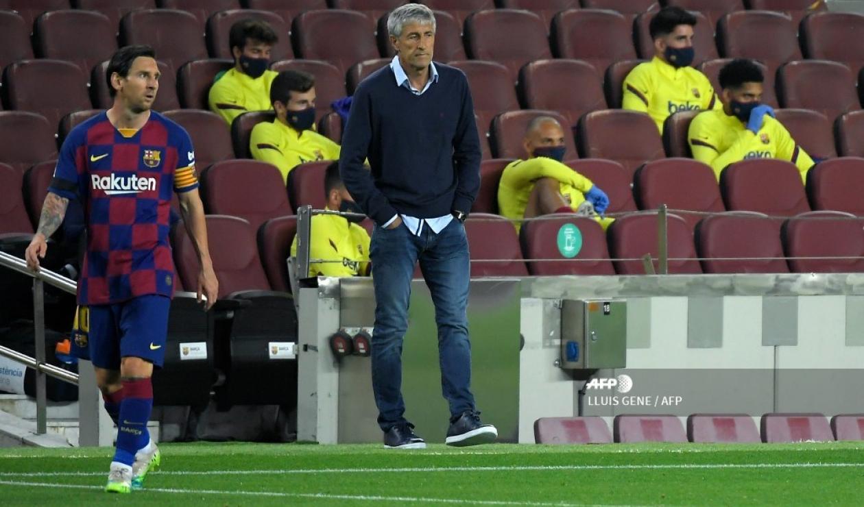 Quique Setién y Lionel Messi