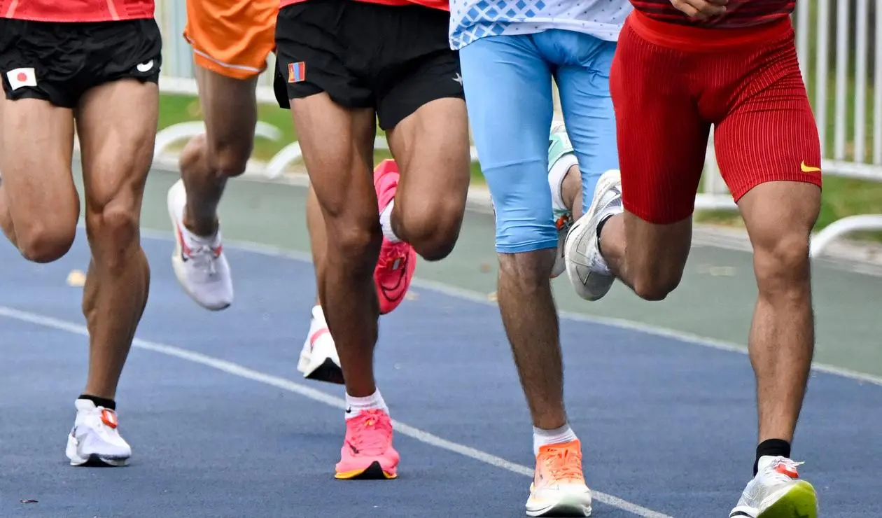 He Jie ganó la media maratón de Pekín