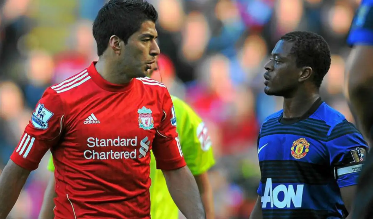 Evra y Suárez en la Premier League