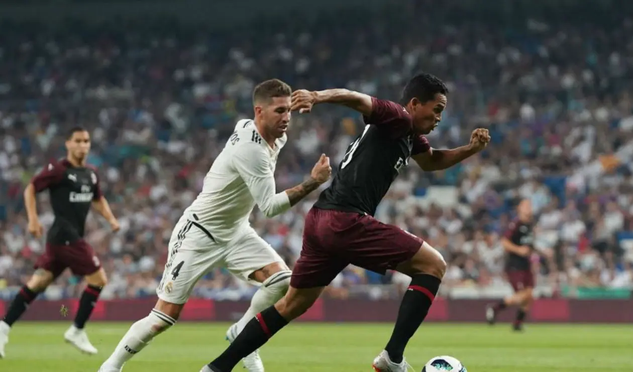 Carlos Bacca (AC Milan) y Sergio Ramos (Real Madrid)