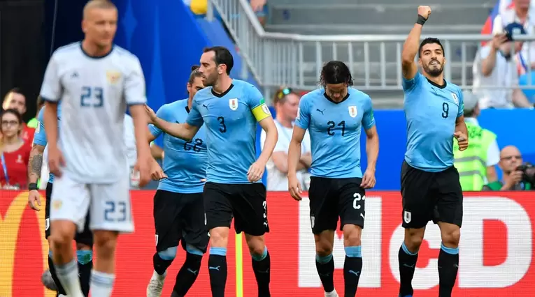Luis Suárez celebra el primer gol de Uruguay ante Rusia