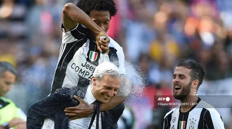 Cuadrado y Allegri en Juventus