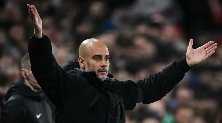 Pep Guardiola en juego del Manchester City