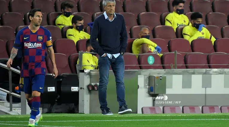 Quique Setién y Lionel Messi