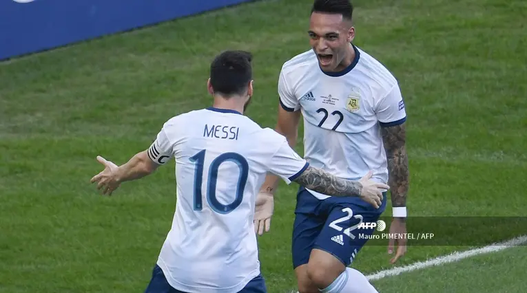 Lionel Messi y Lautaro Martínez