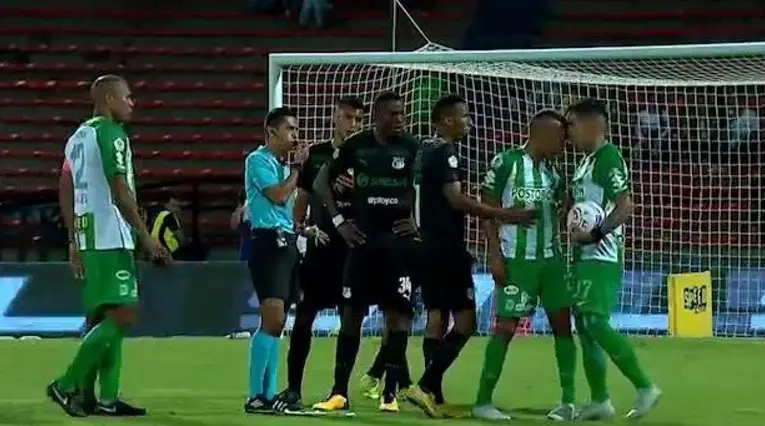 Pelea Dayro y Lucumí en Nacional