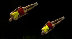 Dos gimnastas en la prueba de trampolín por parejas de los Juegos Centroamericanos y del Caribe Barranquilla 2018 