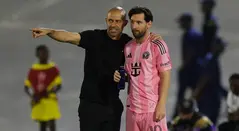 Javier Mascherano y Lionel Messi, entrenador y futbolista
