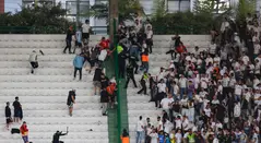 Pelea de hinchas de Once Caldas y Huracán